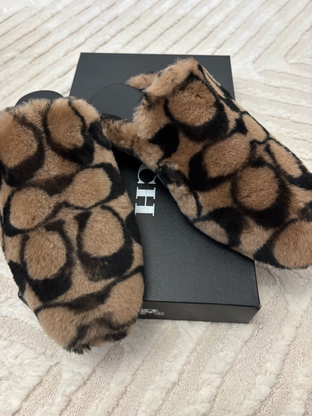 Coach Leopard Print Faux Fur Slides in Brown and Black